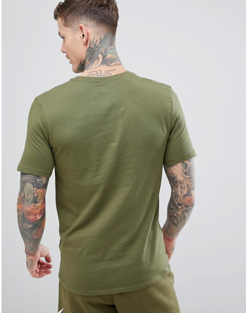 Теннисная  футболка NIKE NSW TEE CLUB EMBRD FTRA KH