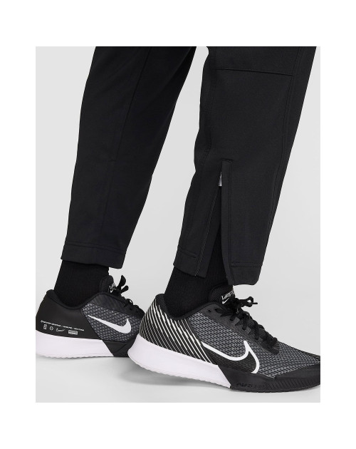 Теннисные брюки NIKE M HERITAGE SUIT PANT bk